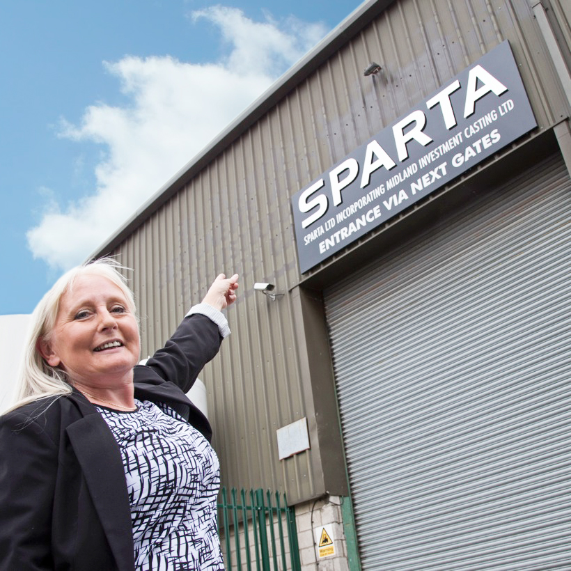 SDA's Sue Lawson showcasing the Sparta's new signage.